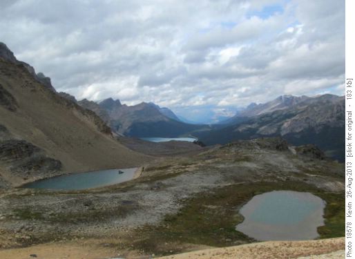 The two tarns in Crowfoot Pass with Bow Lake in the distance