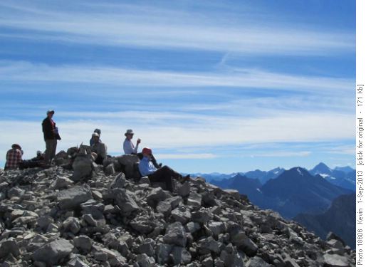 Enjoying the views from a windless summit