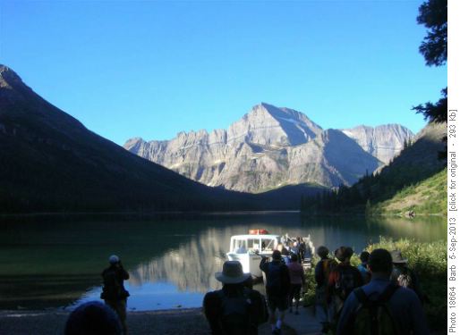 Taking boat across Swiftcurrent Lake