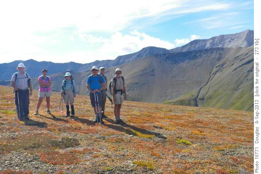 Group on Highwood Ride. The scree descent route is the open scree below the cliff band. Group on Highwood Ride. The scree descent route is the open scree below the cliff band.