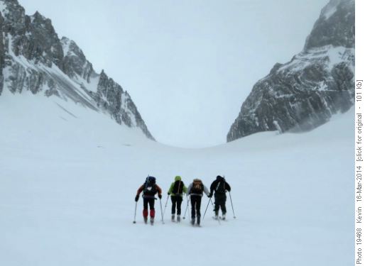 Head down, leaning forward into a very strong wind on the French Glacier