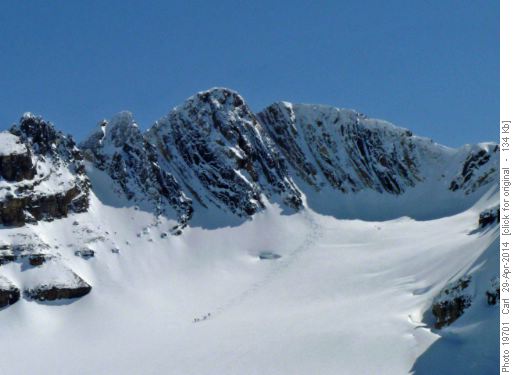 Four Ramblers on their descent off the north side of Cirque Peak