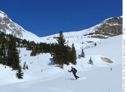 Carl making tele turns on corn snow in the lower bowl