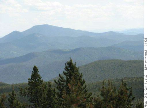 Blue ridges march away to horizon
