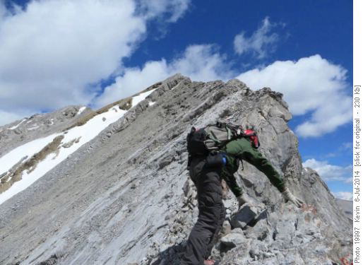 Damian scrambling on a more exposed section of the upper ridge