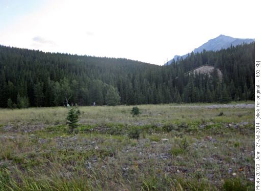 Trailhead for horse trail up the South Ghost behind hikers.