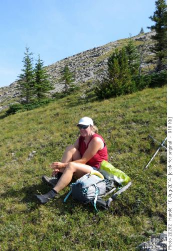 Theresa enjoying a break and the view on the way up