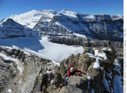 John scrambling on a narrow section of the summit ridge