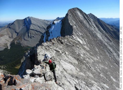 Damian scrambling below the summit cairn of GR616953