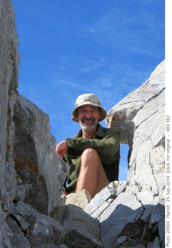 Francisco's smiling face peering down from the notch at ridge top.
