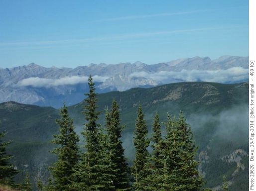 Fog lifting from valley bottom