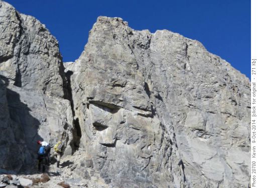 The difficult chimney crux below the summit