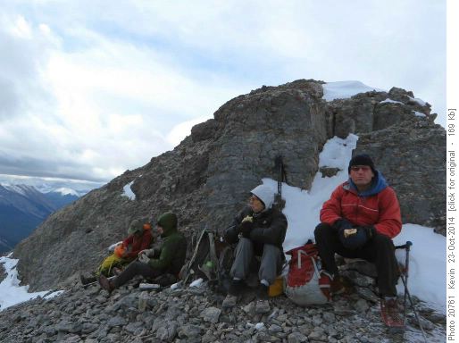 Summit snack break kind of out of the wind