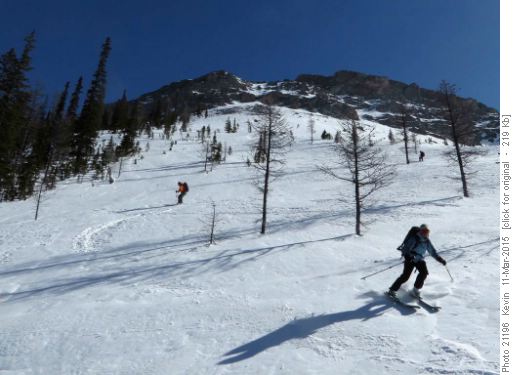 Skiing down the sun affected lower slopes towards Commonwealth Creek