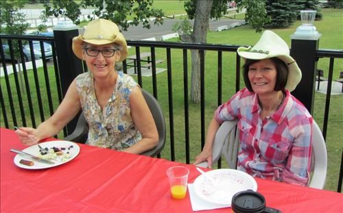 Pancake breakfast helpers {1129 Denise Taylor} & {1817 Anne Rose} get a chance to chow down
