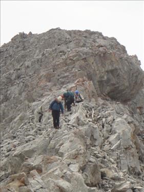 {532 John Du}, {976 Jeann Pro} and {1316 Cel Soul} descending NE ridge of Mount Fullerton