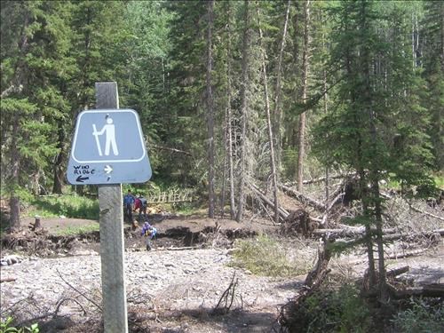 Trail sign at site of OLD bridge