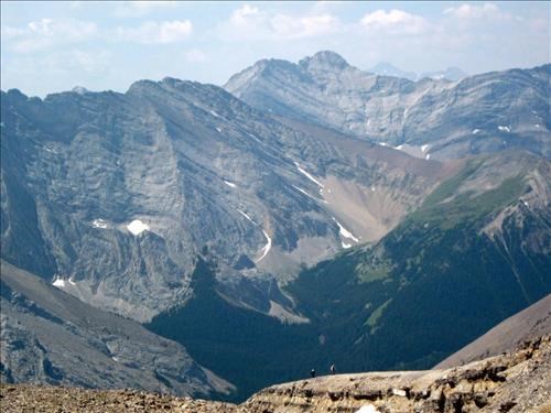 {607 Dam Gann} and {212 Dav Mull} on summit ridge Mount Romulus, Mount Evan-Thomas in the background.