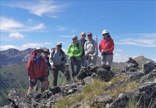 Group at the south Summit with the North Summit on the far right