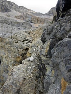 Ramp on cliff band on ascending Mount Noyes