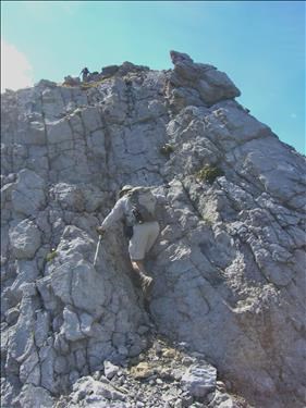 Philip ascending scrambly section (with his pole!)