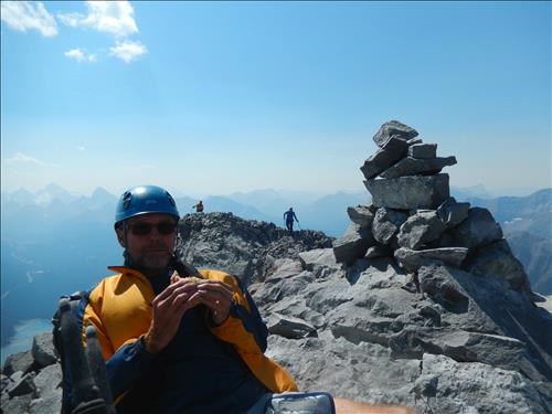 Bill enjoying lunch on the summit of Nestor
