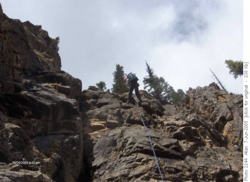 Evelyn doing a rappel down final section