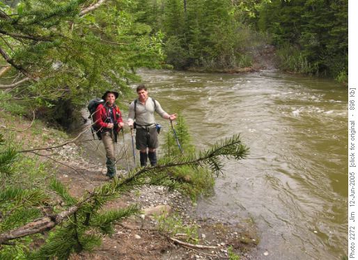 Mike and Mark standing by the ford of a flood swollen Etherington Creek.