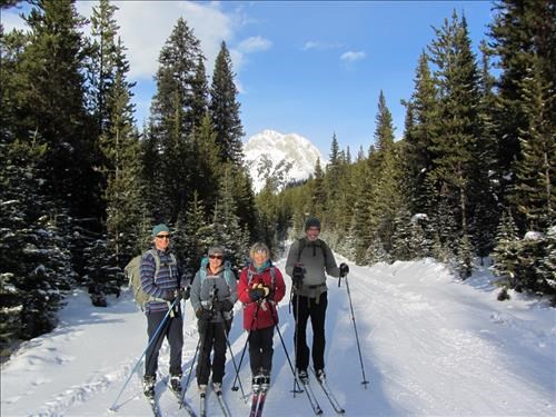 Philip, Nancy, Barb and Bernie pose at Whiskeyjack junction