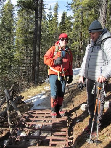 {433 Ivan Pull} & {866 Bill Hanec} comtemplate how to get air while hiking over this new-fangled cattle guard