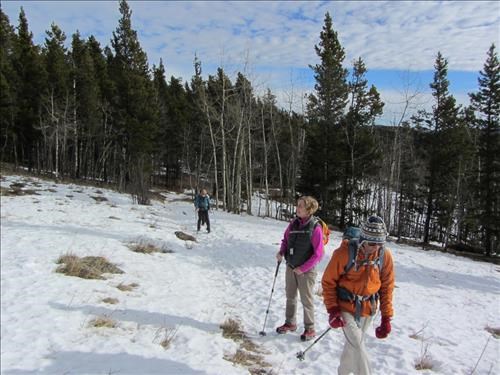 {198 Madeleine Mangels} and {179 Ghulam Jamro} along a snowy part of Sulphur Springs trail