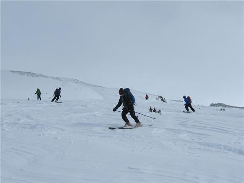 Ramblers skiing the upper slopes