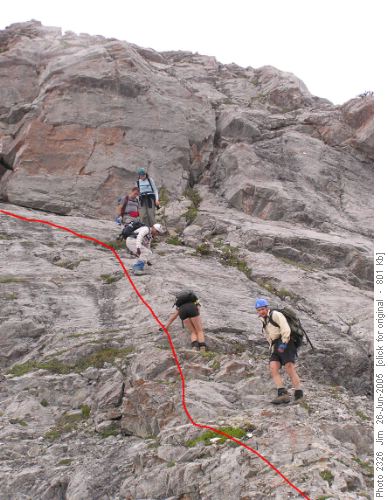 This shows the route up the sloping slab and around the bulge in the rock. This shows the route up the sloping slab and around the bulge in the rock.