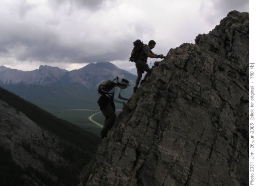 Kerry and Jerome silhouetted against the stormy skies of the Kananaskis Valley. Kerry and Jerome silhouetted against the stormy skies of the Kananaskis Valley.
