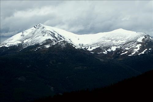 Lipalian Mountain and Unity Peak make a brief appearance on our way down.
