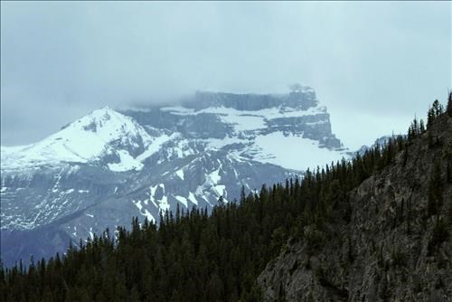 Close up of Mt. Bourgeau under cloud.