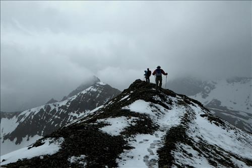 We experienced fierce winds and graupel on the way to the highest peak.