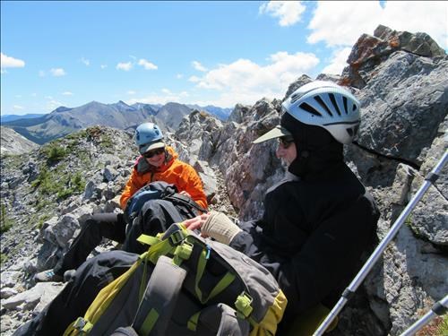 Enjoying a break from the wind on the summit of Baldy