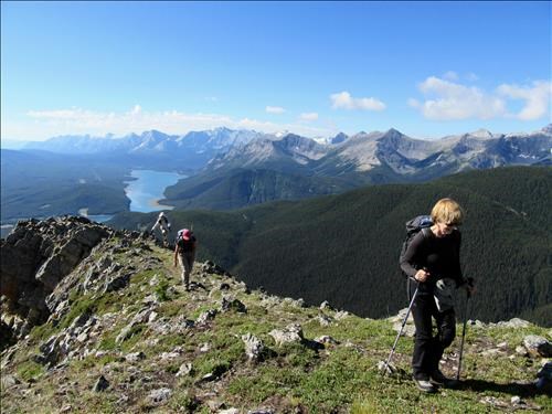 Marg on the upper ridge with Kananaskis Lake in the distance