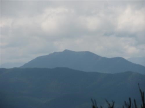Dark clouds gathering over Raspberry Ridge, our original destination