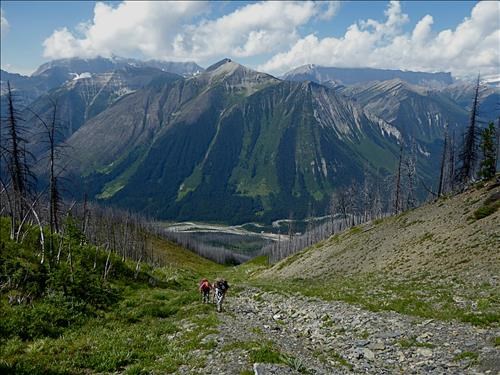 Going up the gully with Vermilion Range in the background.
