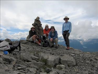 {1831 Bill R}, {256 Arnold W}, {188 Bill L} and {607 Damian G} at the summit