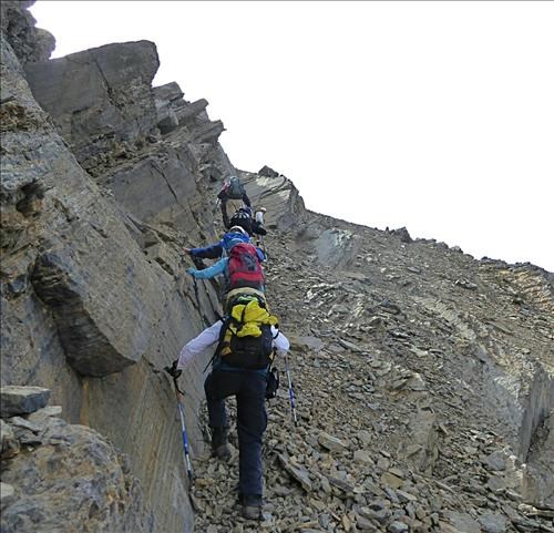 Just below the ridge.