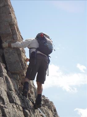 Harold skillfully descends the SC6 section of summit block of Mt. Cory's West Ridge.