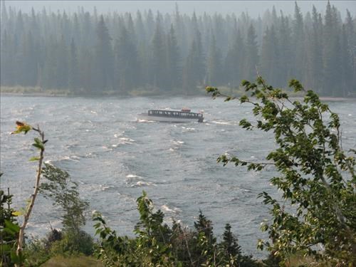 Tour boat Sinopah on rough water on windy day on Two Medicine Lake
