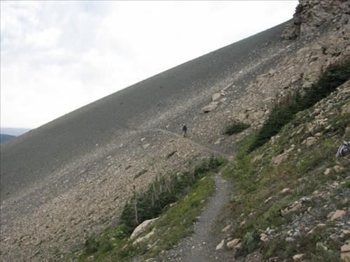 Well-graded trail cuts across steep scree slopes to Firebrand Pass