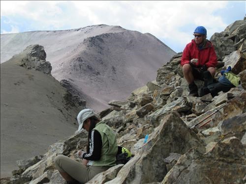 Lunch at the base of Unity Peak with Purple Peak in the background Lunch at the base of Unity Peak with Purple Peak in the background