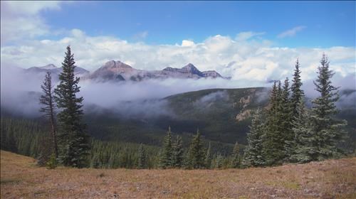 A brief break in the clouds opened up a view on Mt Rose (2532m) and Three-point Mountain (2595m)