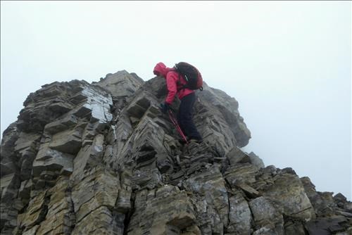 Shirley down climbing the crux.
