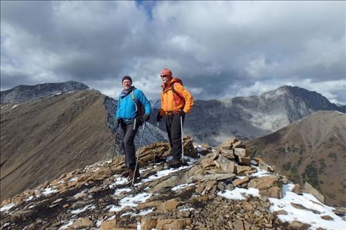 Kevin and John on the summit of Highwood Ridge (Grizzly Ridge, Tyrwhitt and Pocaterra in bkg)